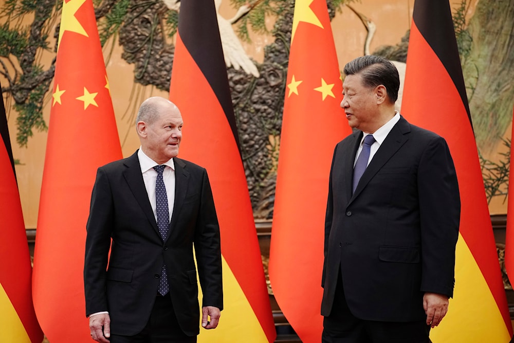 German Chancellor Olaf Scholz, left, meets Chinese President Xi Jinping at the Great Hall of People in Beijing, China, Friday, Nov. 4, 2022. (Pool/AP)