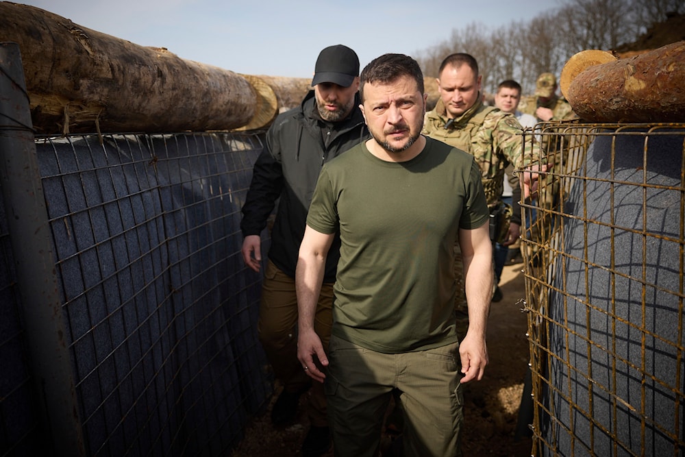 Ukrainian President Volodymyr Zelenskyy inspects the fortification lines in Kharkiv, Tuesday, April 9, 2024. (Ukrainian Presidential Press Office via AP)