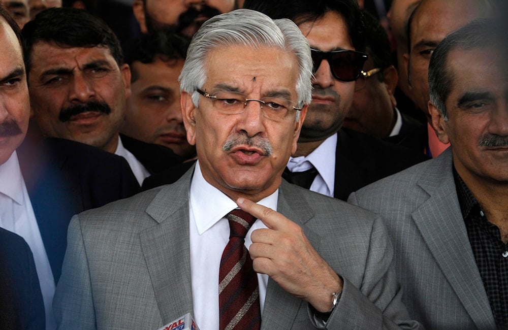 Pakistani Defense Minister Khawaja Muhammad Asif speaks to journalists outside the Supreme Court, in Islamabad, Pakistan, Tuesday, Nov. 1, 2016. (AP)
