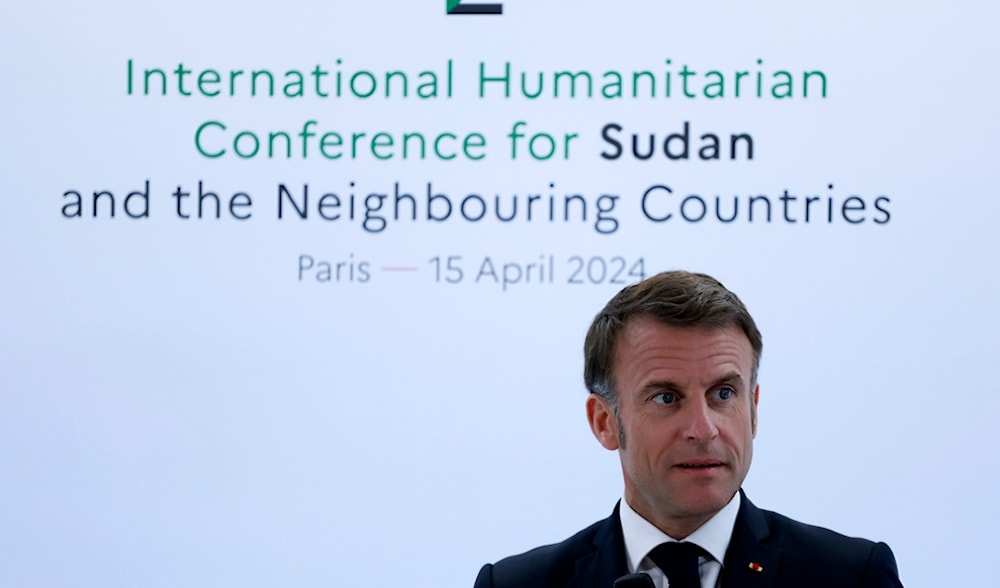 French President Emmanuel Macron attends a session at the international conference on Sudan, Monday, April 15, 2024 in Paris (AP)