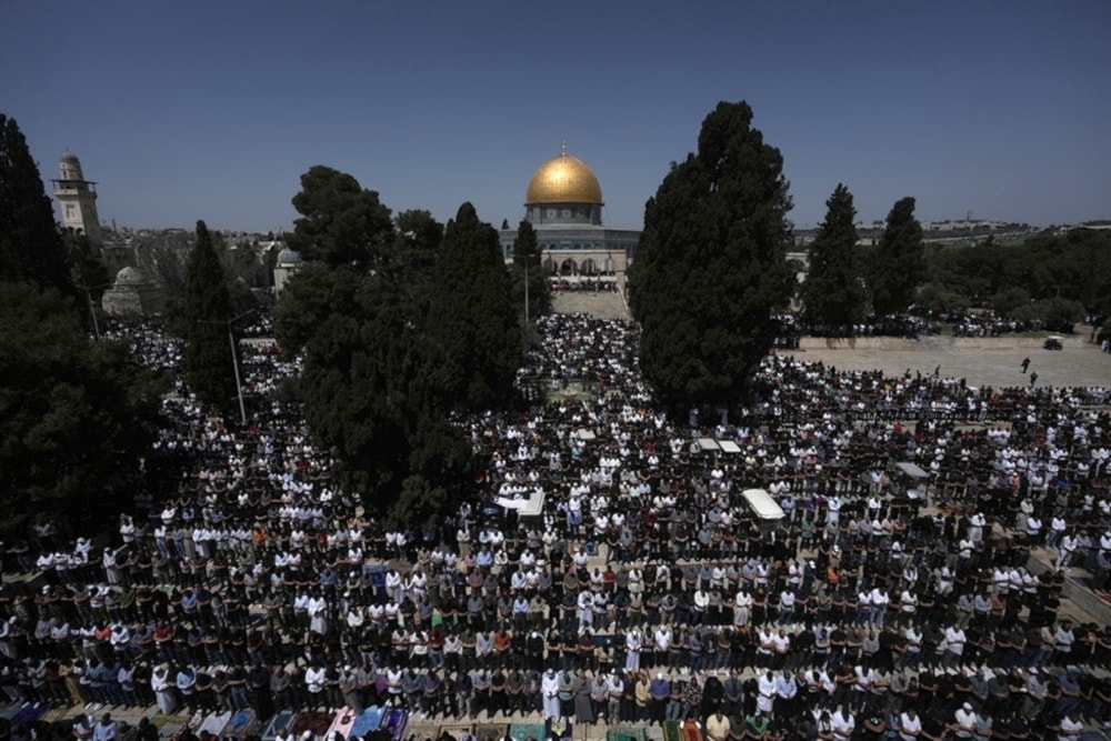 Muslim worshippers gather for Friday prayers, next to the Dome of the Rock Mosque in al-Aqsa Mosque in al-Quds, on April 5, 2024. (AP)