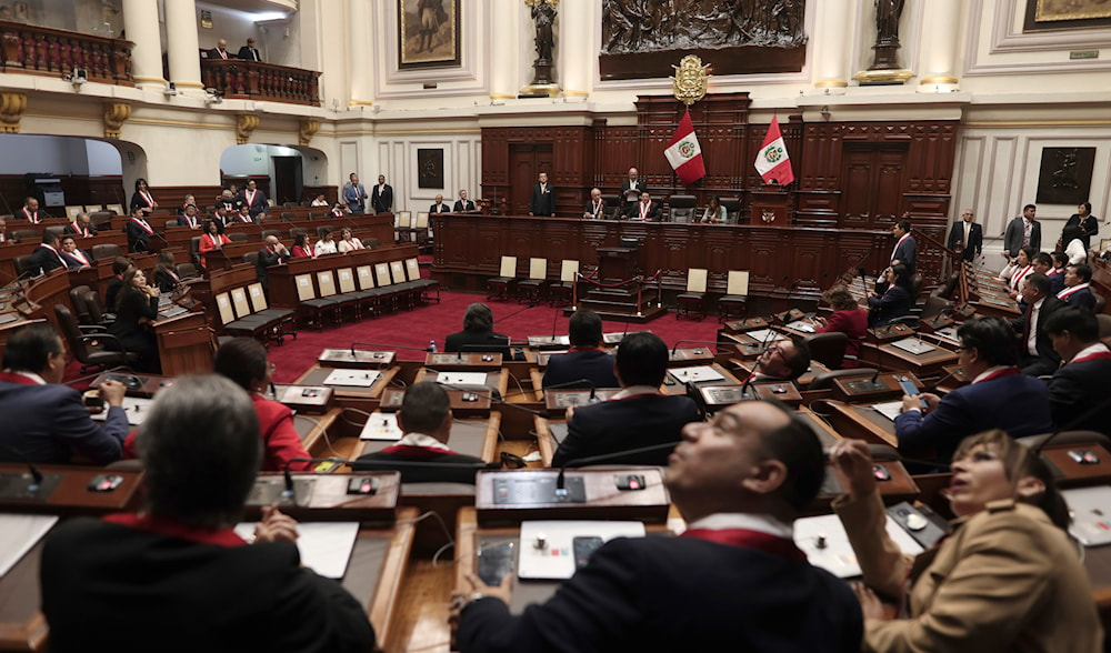 Lawmakers sit inside Congress as they wait for the arrival of Peruvian President Dina Boluarte, in Lima, Peru, July 28, 2023 (AP)