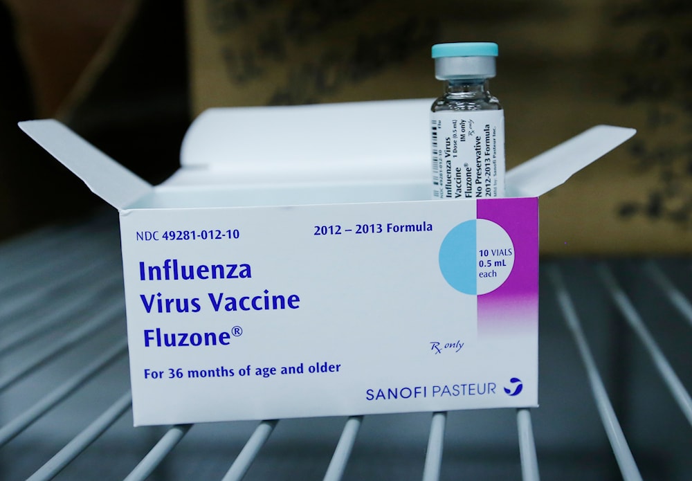 A flu vaccine for those three years old and older is displayed for a photographer in the storage refrigerator at the Oklahoma City-County Health Department in Oklahoma City, Thursday, Jan. 10, 2013. (AP)