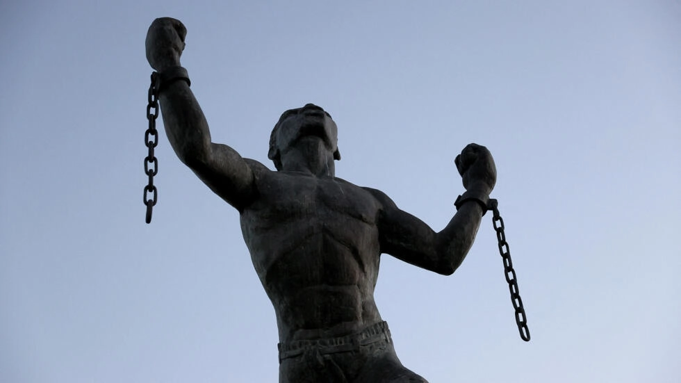 The Emancipation Statue, symbolizing the breaking of the chains of slavery at the moment of emancipation, is seen on November 16, 2021 in Bridgetown, Barbados. (AFP)