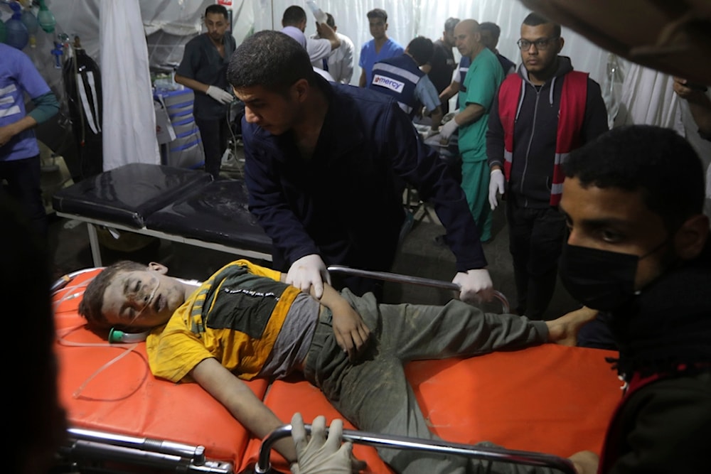 A Palestinian child seriously wounded in the Israeli bombardment of the Gaza Strip is brought to the Kuwaiti Hospital in Rafah refugee camp, southern Gaza Strip, late Friday, April 19, 2024. (AP)