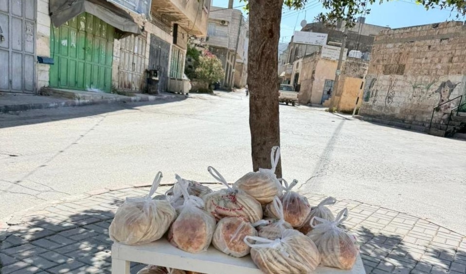 Bread left under a tree in Beit Furik, West Bank, as the general strike condemning the Israeli occupation's militarily campaign in Nur Shams begins on April 21, 2024. (Social media)