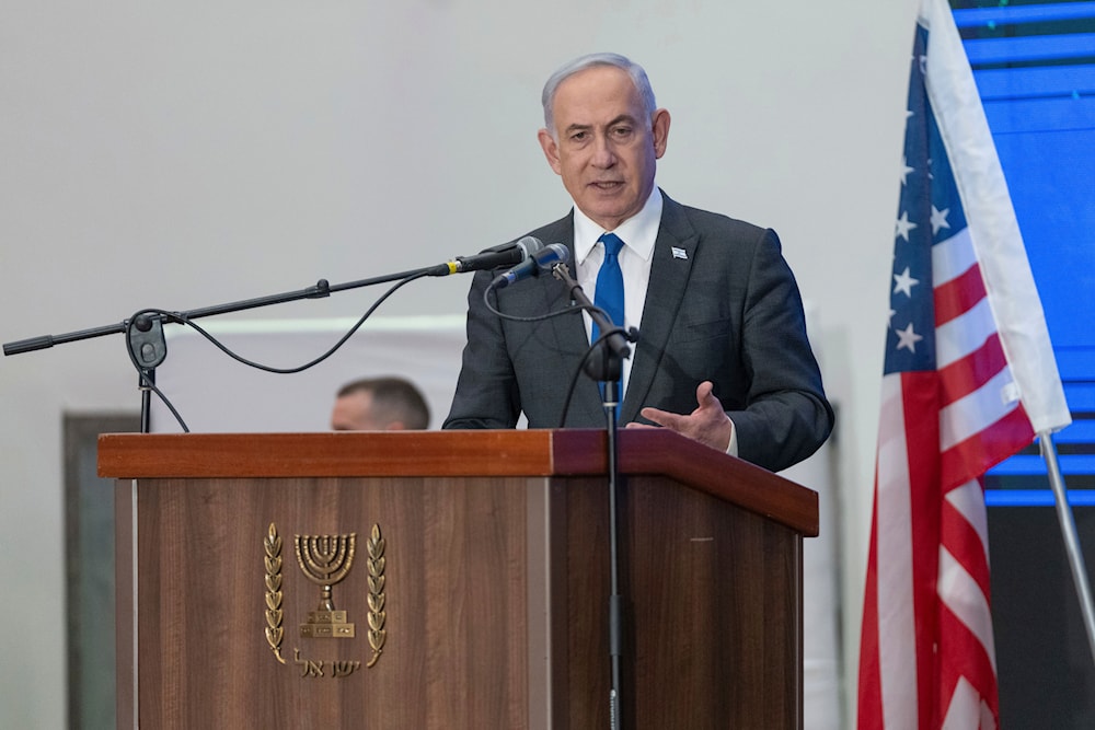 Prime Minister Benjamin Netanyahu speaks during a gathering of Jewish leaders at the Museum of Tolerance in occupied al-Quds, occupied Palestine, February 18, 2024 (AP)