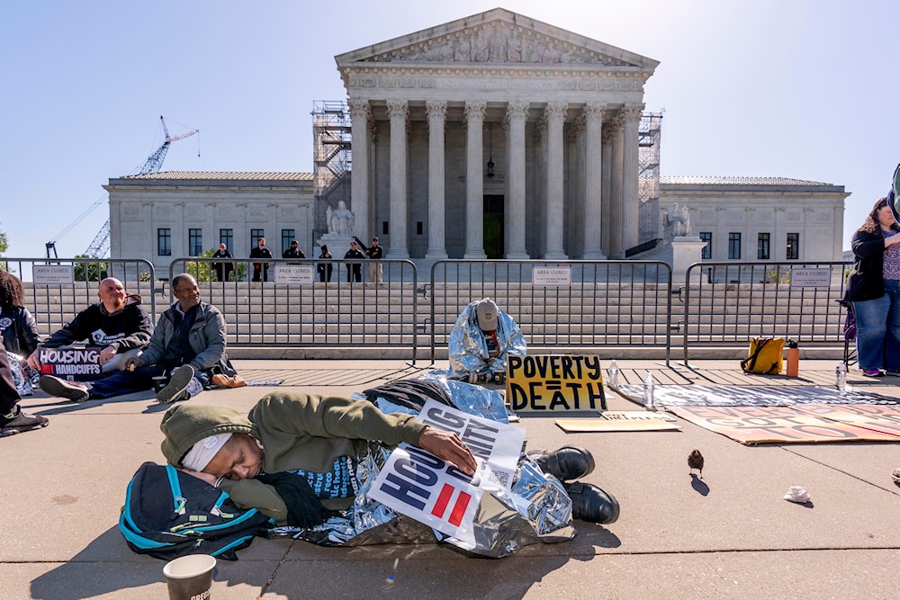 Activists demonstrate at the Supreme Court on Capitol Hill in Washington, Monday, April 22, 2024. (AP)