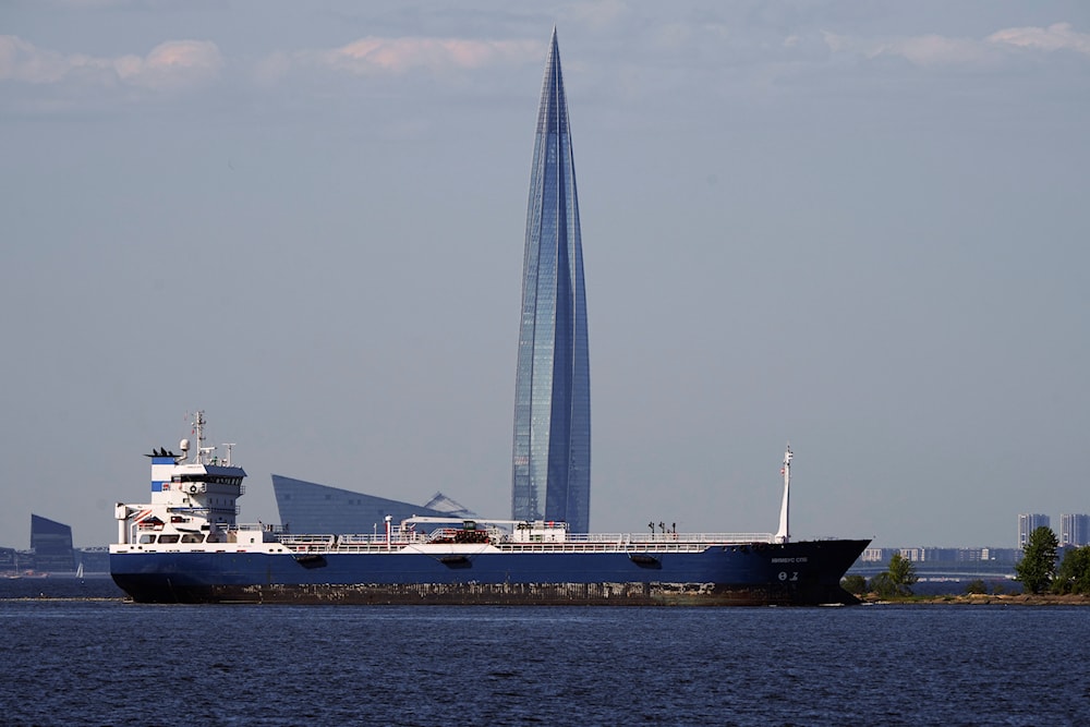 'Nimbus SPB', an oil products tanker, floats in the Finnish Gulf past the Lakhta Center skyscraper, the headquarters of Russian gas Gazprom in St. Petersburg, Russia, on June 11, 2023.