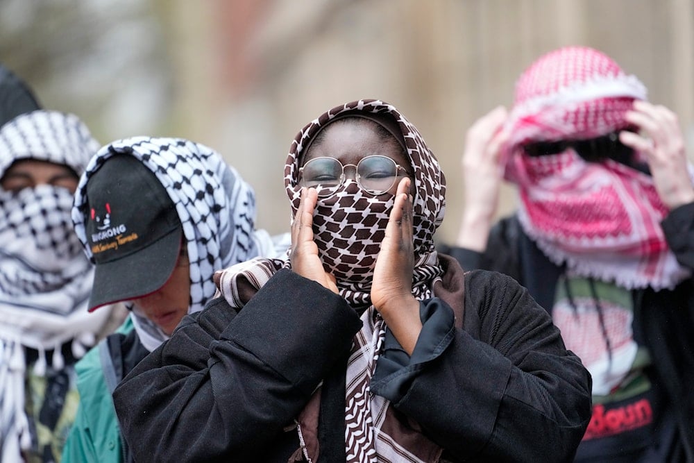 Demonstrators chant slogans outside the Columbia University campus, Thursday, April 18, 2024, in New York. (AP)
