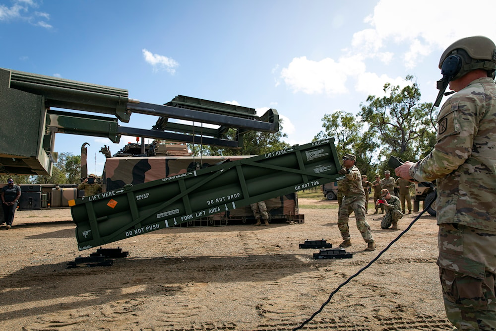 In this image provided by the U.S. Army U.S. Army Staff Sgt. Jimmy Lerma adjusts the Army Tactical Missile System (ATACMS) at Williamson Airfield in Australia, on July 26, 2023 (AP/US Army)