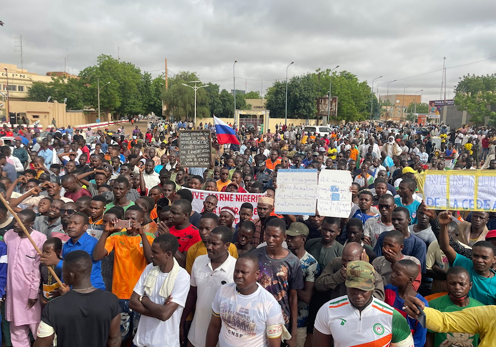  Supporters of Niger's ruling junta, gather for a protest called to fight for the country's freedom and push back against foreign interference, in Niamey, Niger, Thursday, Aug. 3, 2023. (AP)
