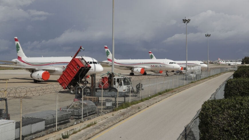 Lebanon's Middle East Airlines (MEA) planes are parked on the tarmac of Beirut International Airport on March 19, 2020. (AFP)