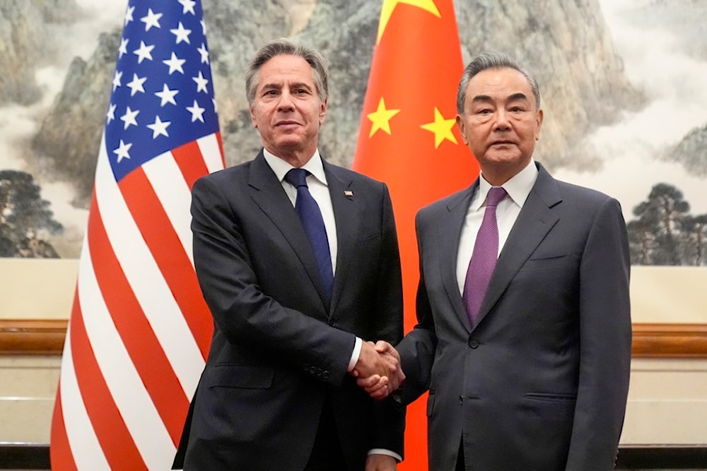 U.S. Secretary of State Antony Blinken, left, meets with China's Foreign Minister Wang Yi at the Diaoyutai State Guesthouse, Friday, April 26, 2024, in Beijing, China. (AP)