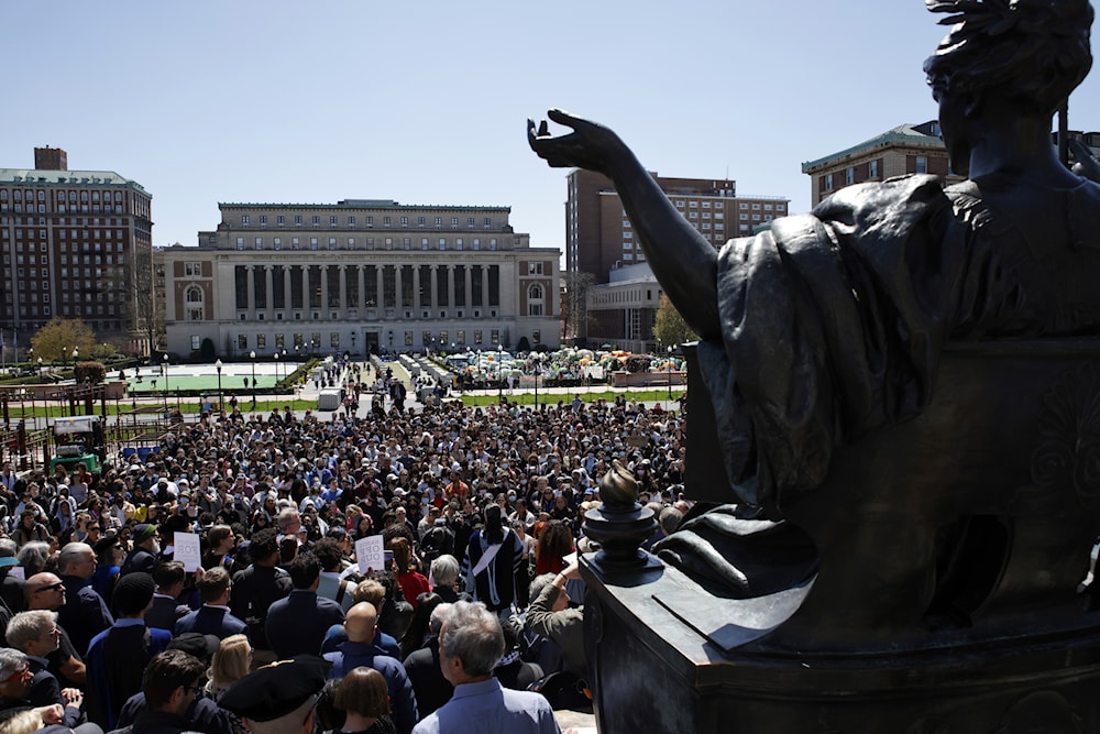 Columbia University professors speak in solidarity with their students' rights to protest free from arrest at the Columbia University campus in New York on Monday, April 22, 2024. (AP)