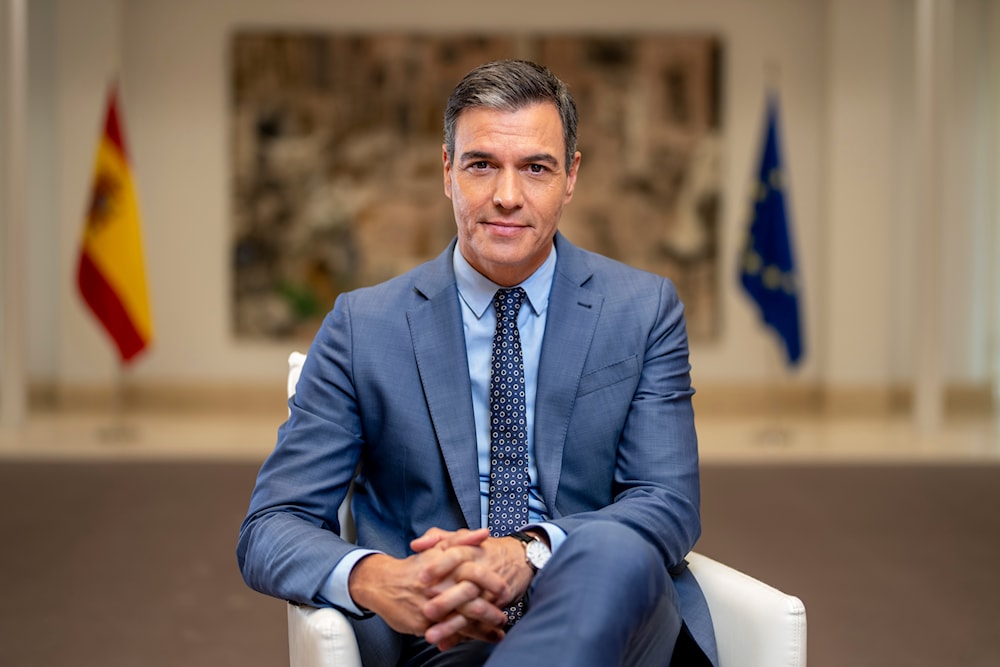 Spain's Prime Minister Pedro Sanchez poses for a portrait after an interview with The Associated Press at the Moncloa Palace in Madrid, Spain, June 27, 2022 (AP)