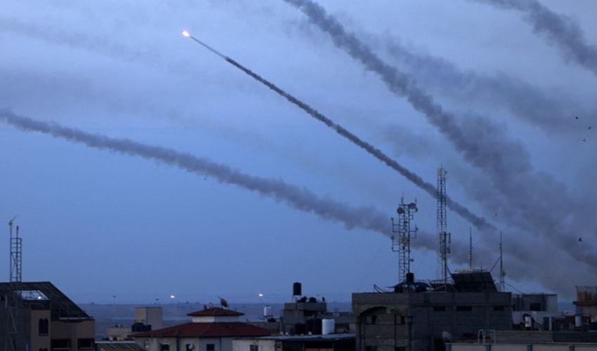 The Palestinian resistance fires rocket salvoes towards the 