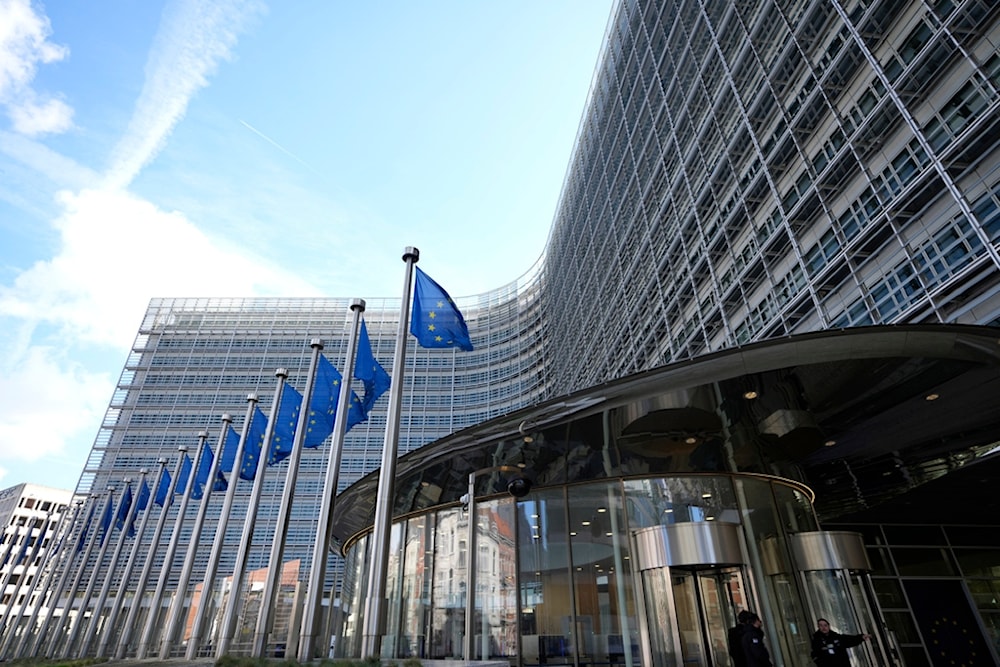 European Union flags flap in the wind outside EU headquarters in Brussels, Monday, March 25, 2024. (AP)