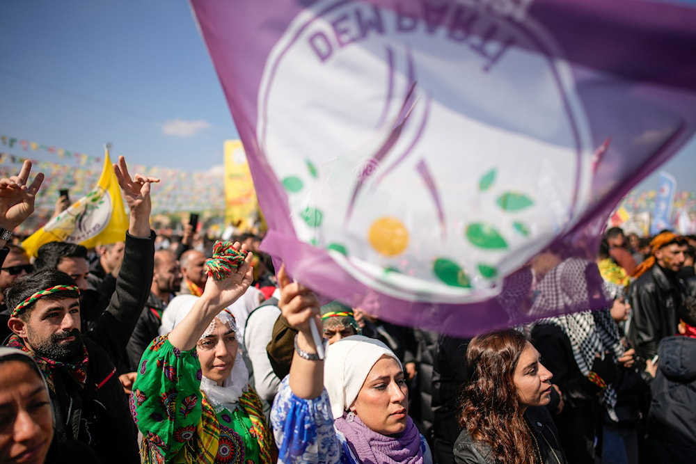 Supporters of the pro-Kurdish Peoples' Equality and Democracy Party (DEM Party) gather to celebrate Newroz festivity, marking the start of spring, in Istanbul, Turkey, on Sunday, March 17, 2024.(AP)