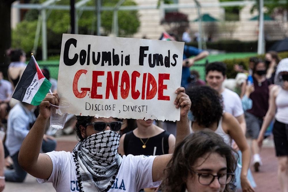 Student protesters march around their encampment on the Columbia University campus, Monday, April 29, 2024, in New York. (AP)