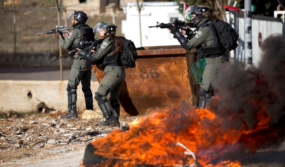 Israeli occupation forces take their position during confrontations at Beit El checkpoint, near the West Bank city of Ramallah, , Jan 29, 2020 (AP)