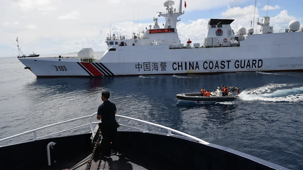 China 'expels' 2 Philippine ships near Scarborough Shoal: State media