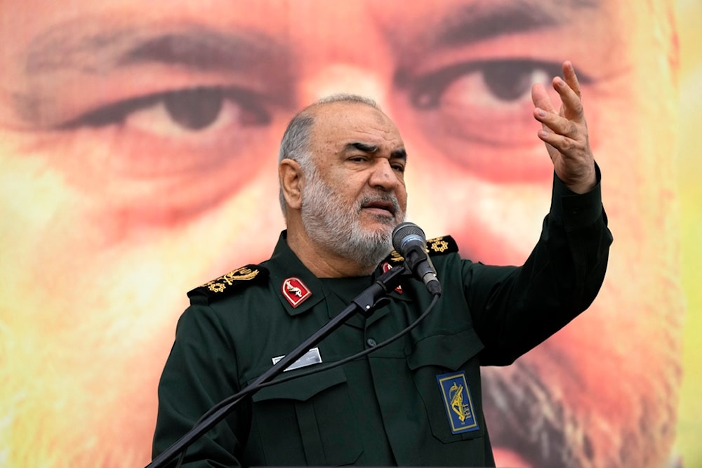 Chief of Iran's paramilitary Revolutionary Guard Gen. Hossein Salami addresses in front of the portrait of Seyed Razi Mousavi, a senior general of the guard, who was killed in an Israeli airstrike in Syria, Iran, Thursday, Dec. 28, 2023. (AP)