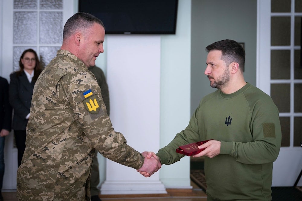 In this photo by the Ukrainian Presidential Press Office, Ukrainian President Volodymyr Zelensky, awards servicemen during his visit to Chernihiv region, Ukraine, Apr. 5, 2024. (AP)