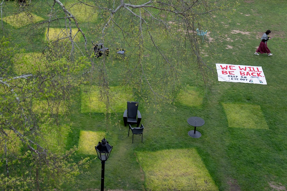 Squares mark a lawn where tents once stood after an encampment protesting the Israel-Hamas war was taken down at Brown University, Tuesday, April 30, 2024, in Providence, R.I. (AP)