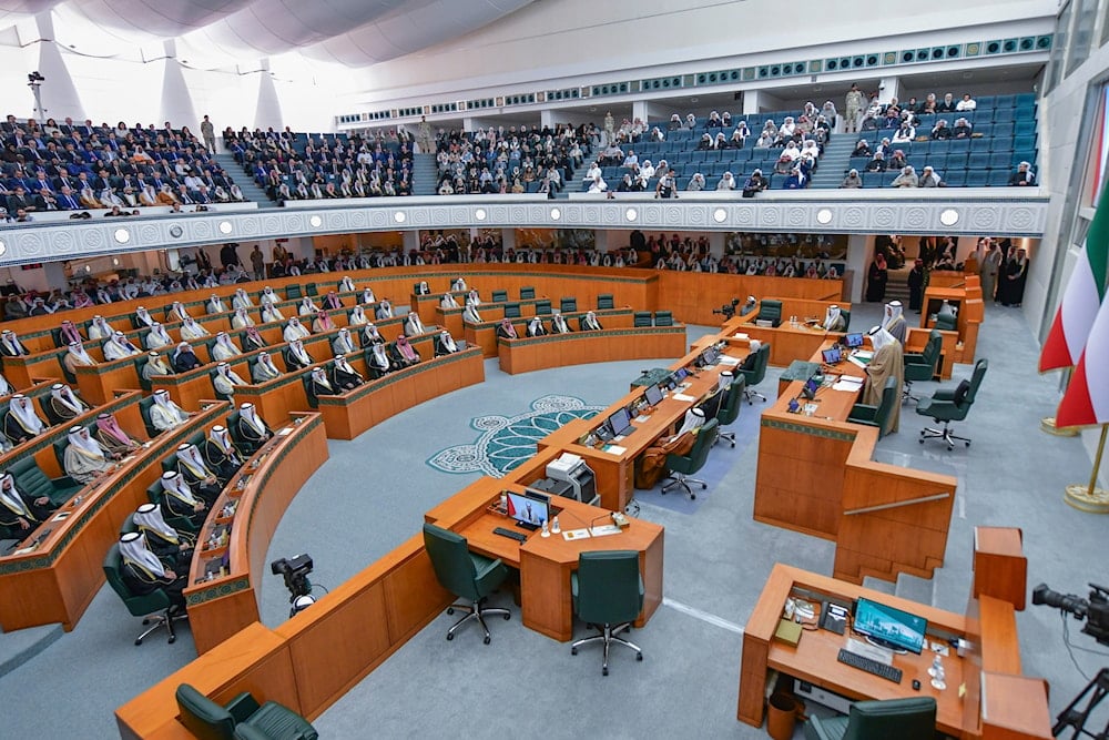 Members of parliament take part of the new Emir of Kuwait Sheikh Meshal Al Ahmad Al Sabah's oath ceremony at the National Assembly in Kuwait City, Kuwait, December 20, 2023 (AP)