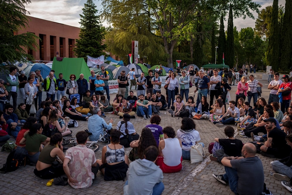 Students gather during a protest against the war in Gaza at the Complutense University in Madrid, Spain, Thursday, May 9, 2024 (AP Photo/Manu Fernandez)