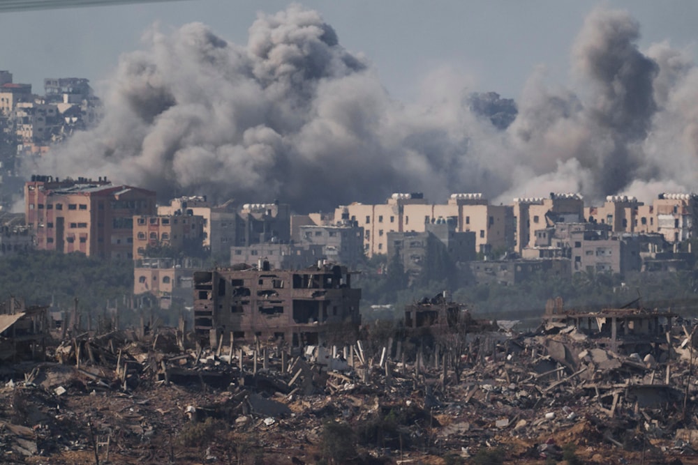 Smoke rises after an Israeli air strike on the Gaza Strip on November 21, 2023. (AP Photo]