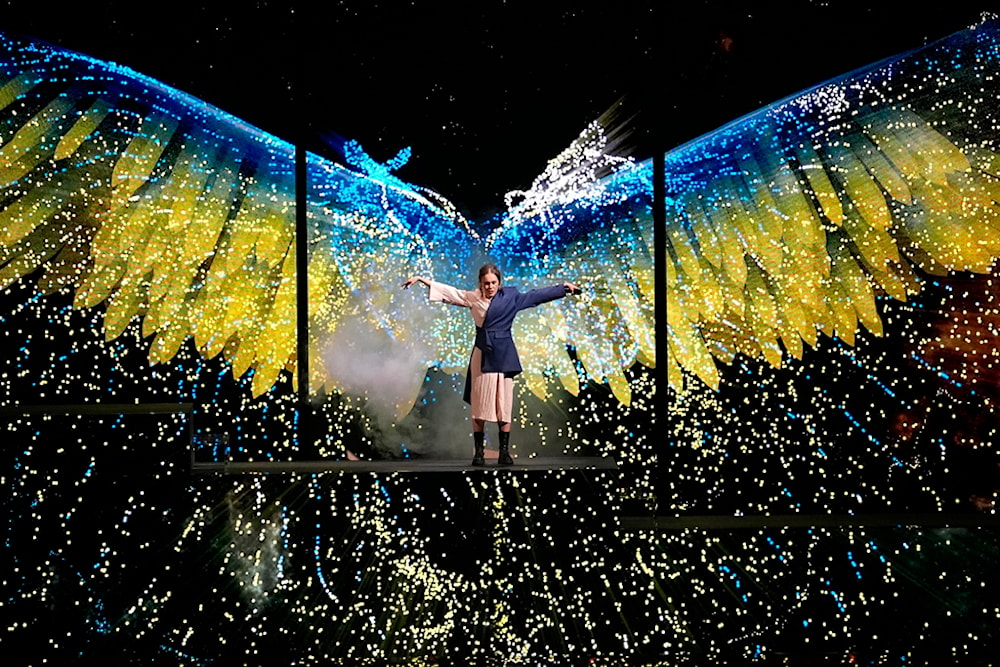 Alyosha from Ukraine performs as a show act during the first semi final at the Eurovision Song Contest in Liverpool, England, Tuesday, May 9, 2023 (AP Photo/Martin Meissner)
