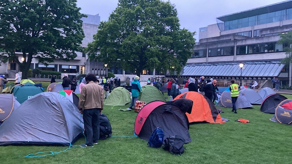 Students at Trinity College Dublin setting up an encampment for Palestine, demanding that their university cut ties with 