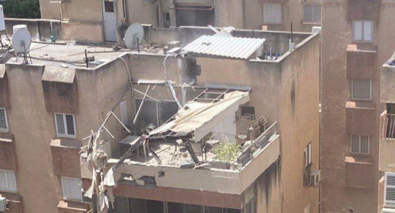 A building hit by a missile launched by Hezbollah in Kiryat Shmona on Sunday, May 5, 2024 (Social Media)