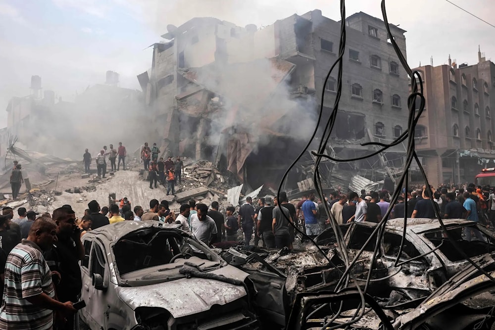 An Israeli airstrike destroyed residential buildings and civilian cars around Jabaliya in Gaza on Monday. (AFP via Getty Images)