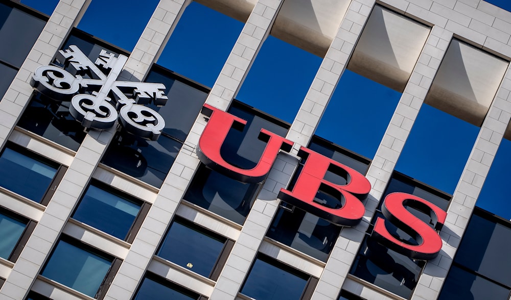 The logo of Swiss Bank UBS is fixed on a building where UBS have offices in Frankfurt, Germany, Tuesday, Nov. 8, 2022. (AP)