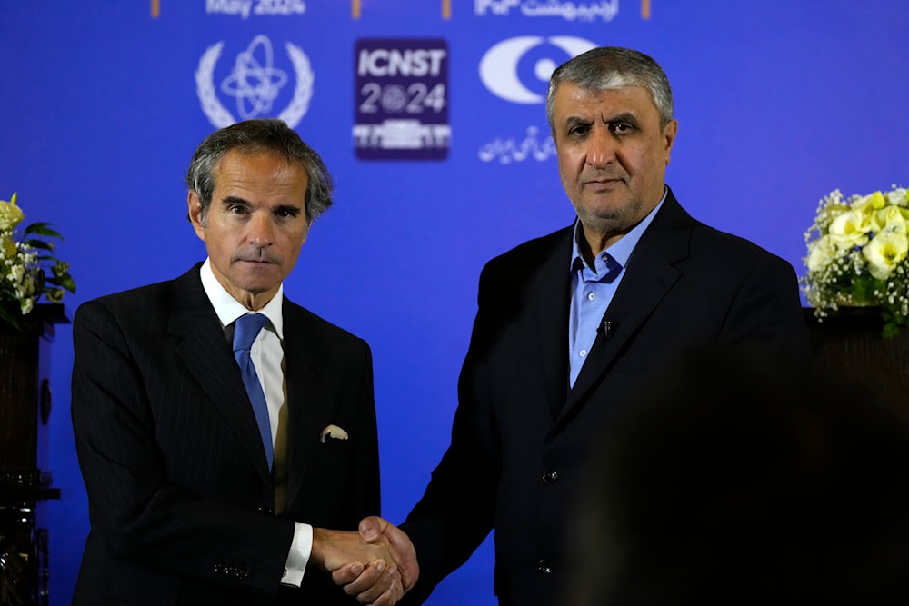 International Atomic Energy Organization, IAEA, Director General Rafael Grossi, and head of Iran's atomic energy department Mohammad Eslami in the city of Isfahan, Iran, May 7, 2024. (AP)