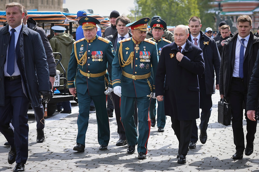 Commander-in-Chief of the Russian Ground Forces Oleg Salyukov, Russian Defense Minister Sergei Shoigu, and Russian President Vladimir Putin leave Red Square after the Victory Day military parade in Moscow, Russia, Thursday, May 9, 2024. (AP)