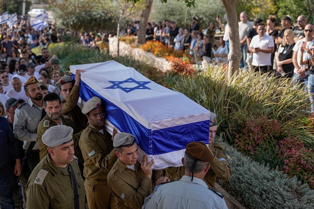 Israeli soldiers carry the flag-draped casket of Corporal. Noa Marciano, during her funeral in Modiin, Israel, Friday, Nov. 17, 2023. (AP)