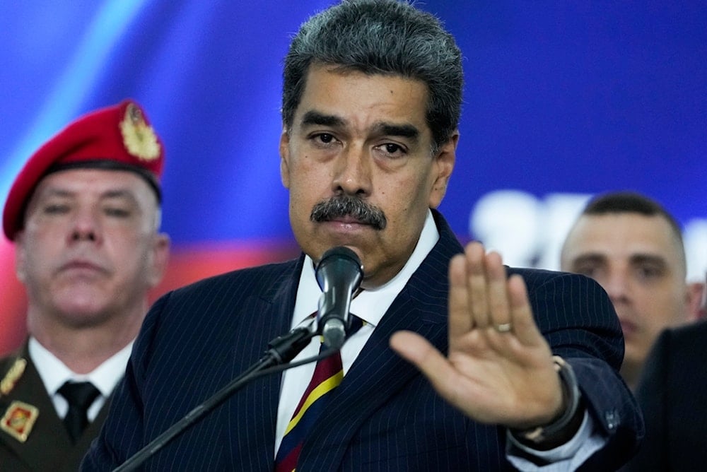 Venezuelan President Nicolás Maduro speaks to the press before leaving the Supreme Court in Caracas, Venezuela, Friday, Aug. 9, 2024. (AP)