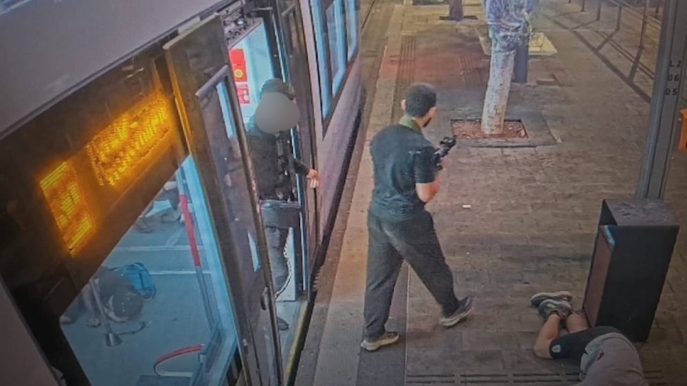 CCTV footage shows an armed shooter amid the shooting operation in Tel Aviv, Oct. 1, 2024 (Social Media)