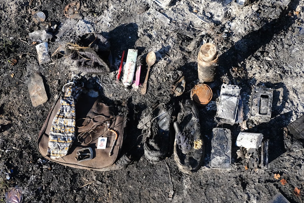 Burnt clothing, backpacks, phones, passports, and other personal belongings were photographed on the Croatian border. (No Name Kitchen)