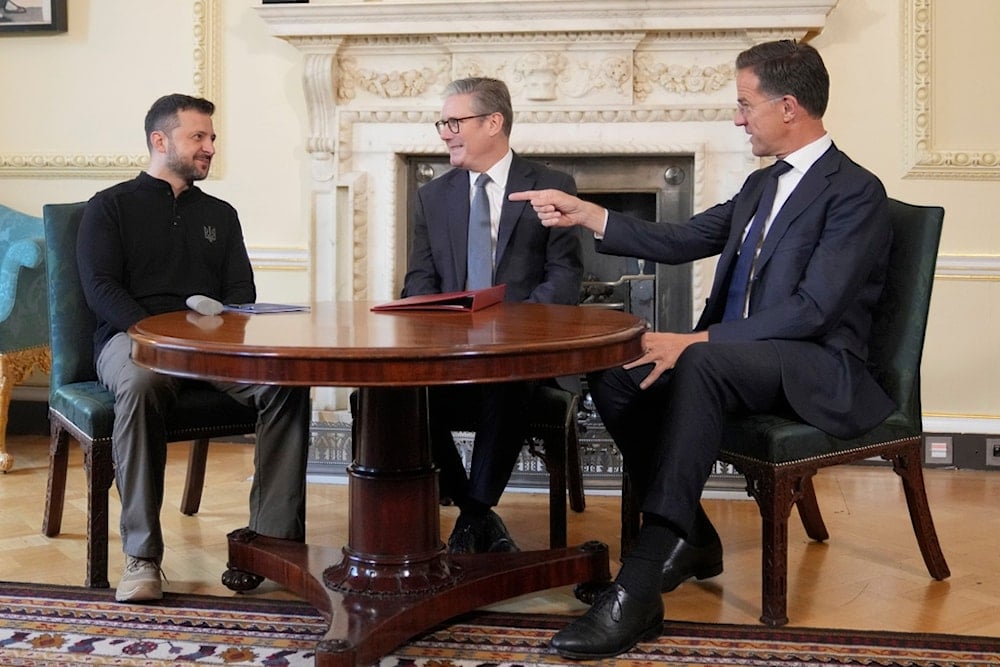 Britain's Prime Minister Keir Starmer, center, NATO Secretary General Mark Rutte, right, and Ukrainian President Volodymyr Zelenskyy meet inside 10 Downing Street in London, Thursday, Oct. 10, 2024.(AP)