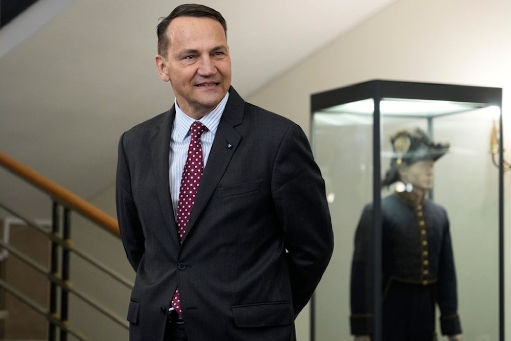 Polish Foreign Minister Radosław Sikorski waits for the arrival of U.S. Secretary of State, Antony Blinken for a talks in Warsaw, Poland, Thursday, Sept. 12, 2024. (AP)