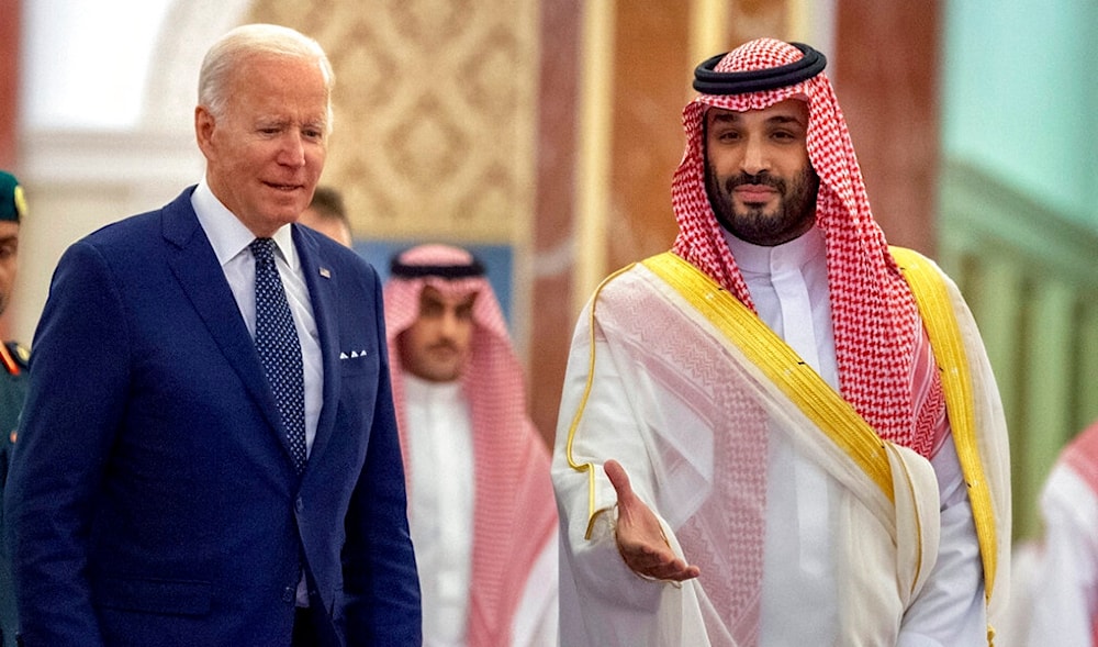 Saudi Crown Prince Mohammed bin Salman, right, welcomes U.S. President Joe Biden to Al-Salam Palace in Jeddah, Saudi Arabia, July 15, 2022. (Saudi Royal Palace via AP)