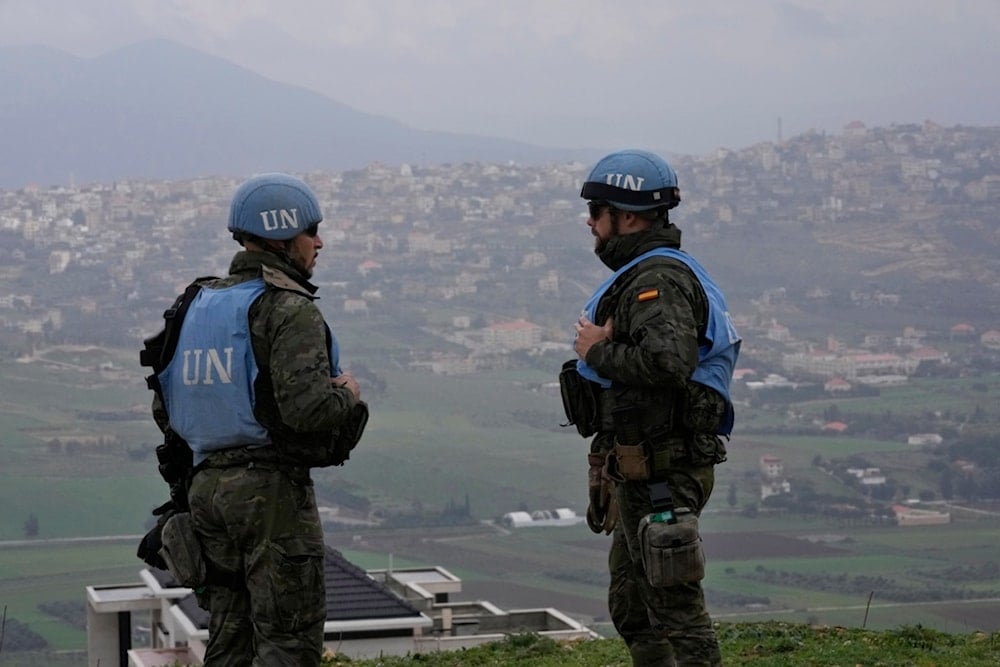 Spanish US peacekeepers stand on a hill overlooking the Lebanese border villages with Israel in Marjayoun town on Wednesday, Jan. 10, 2024.