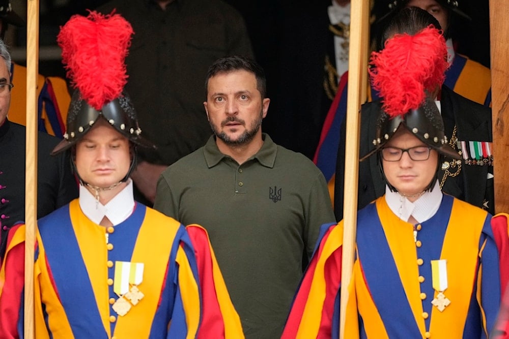 Ukraine's President Volodymyr Zelenskyy leaves at the end of a private meeting with Pope Francis, at the Vatican, Friday, Oct. 11, 2024. (AP Photo/Andrew Medichini)