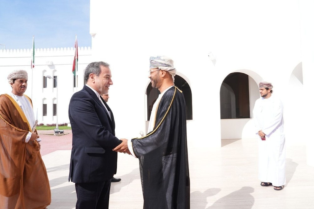 Omani Foreign Minister Badr bin Hamad Al Busaidi receives his Iranian counterpart Abbas Araqchi in Muscat (IRNA).