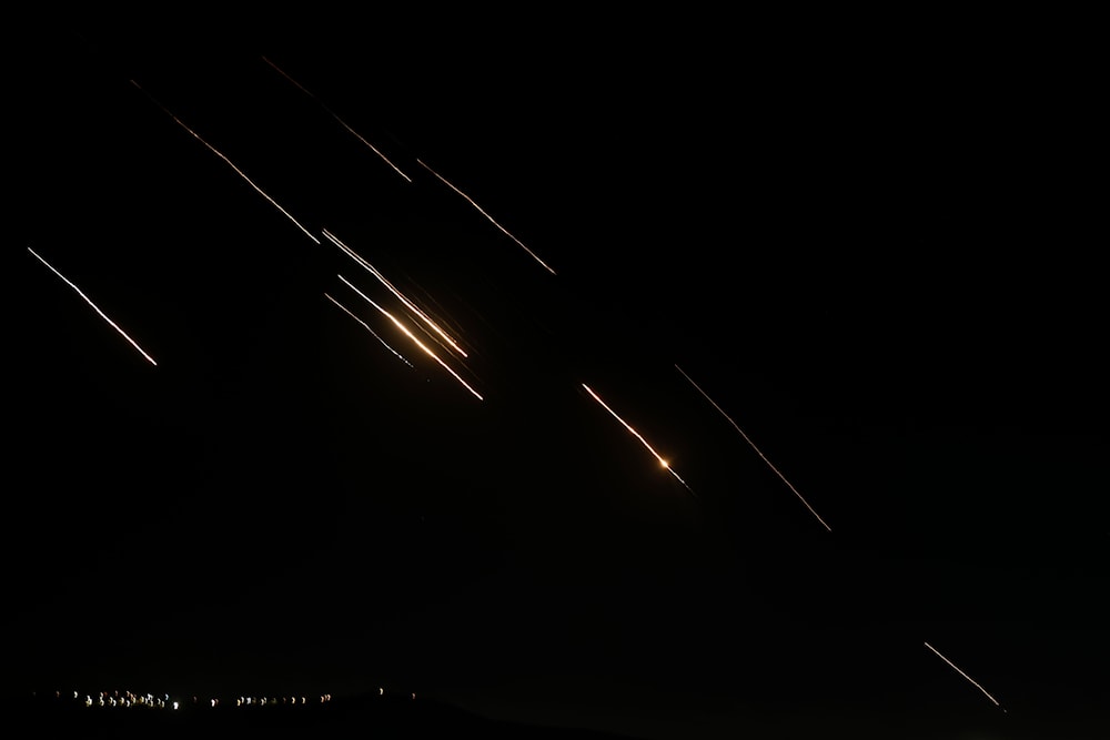  Missiles launched from Iran towards Israel are seen in the West Bank city of Nablus on October 1, 2024. (AP)